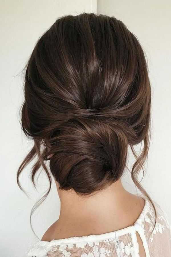Braided Bun with Loose Tendrils